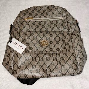 NWT luxury designer backpack handbag purse tote bag. Measures 13.5x13.5